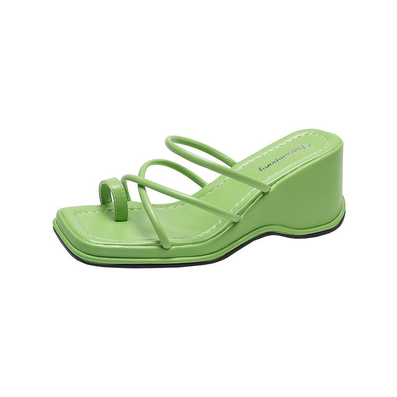 Platform Strappy Slip On Sandal With A Toe Strap Detail